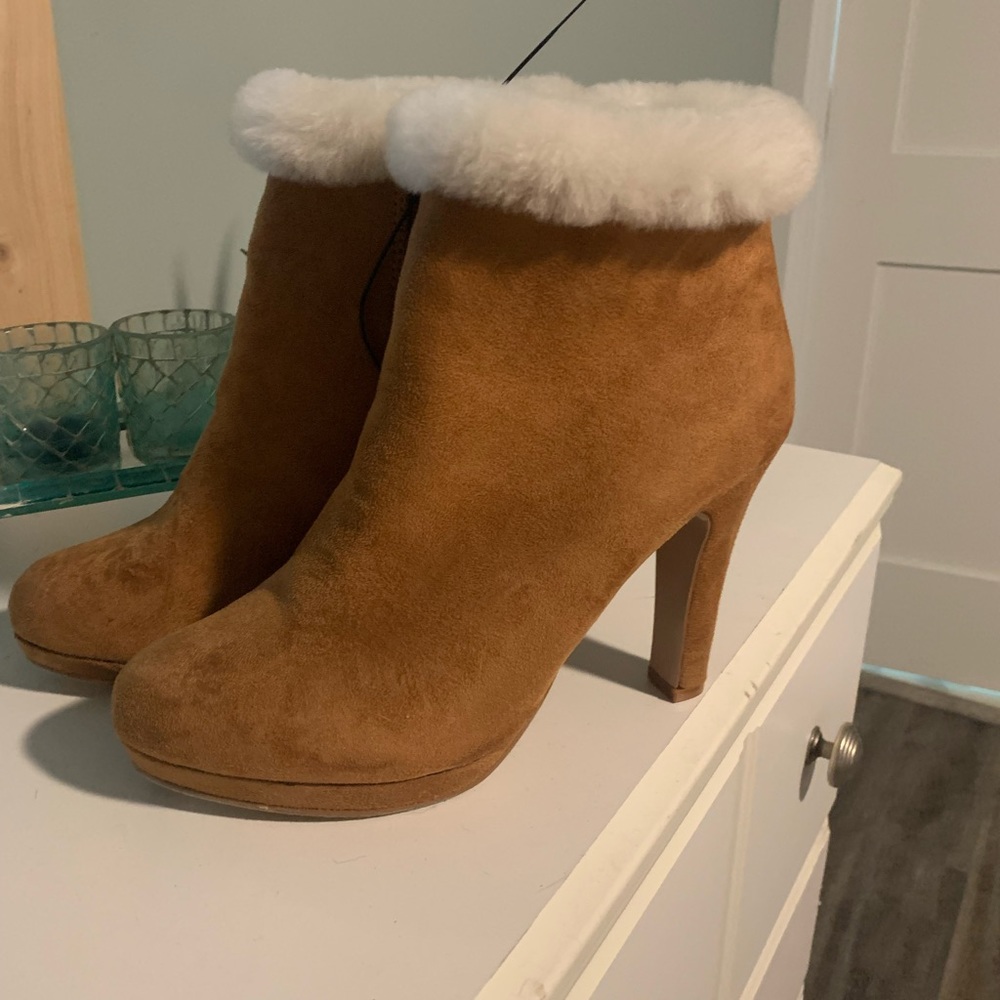 Fashionable brown heeled booties with white fur ankle. Size 8.5